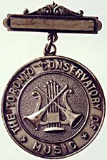 Front of the Toronto Conservatory of Music silver medal
