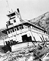 Photograph of the S.S. NASUTLIN sunk after wintering in a river at Dawson, Yukon Territory