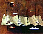 Collage de Joan McCrimmon Hebb représentant une île formée de la toile rayée d'une chaise longue fixée dans le sable par des branches d'arbre, sur laquelle se trouvent de petits villages de pêcheurs et un phare et autour de laquelle sont déposés de petits bateaux